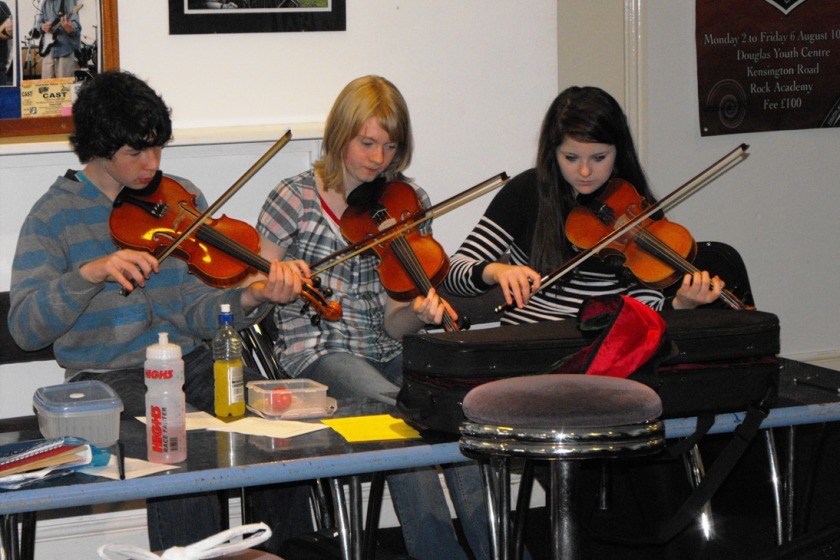 Isla, Robin and Alex getting to grips with a new tune